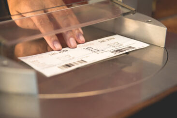 branding photography, lifestyle corporate photography, photo of the hand of a cinema cashier employee handing a ticket to a client, Rialto Amsterdam