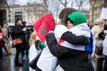 Journalistic photography, event photography, women hugging each other at demonstration in Paris after the terrorist attack at Charlie Hebdo and November 2015 Paris attacks - Paris, France