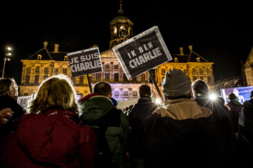 Journalistic photography, event photography, crowd holding signs at demonstration after the terrorist attack at Charlie Hebdo - Amsterdam, The Netherlands