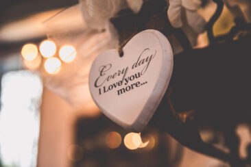 Bruidsfotograaf, trouwfotograaf, Wedding photography, bride photography, elopement photographer, marriage photography, photo of a wooden heart with written on it "Every day I love you more" at a wedding in Amsterdam