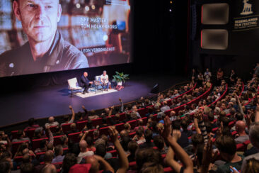 Corporate event photography, conference photography, Masterclass and panel discussion, the audience is participating during a Q&A session at Nederlands Film Festival, Utrecht