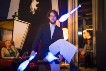 Corporate event photography, party photography, an artist juggler is performing during a party at Hyatt Place Hotel, Hoofddorp Amsterdam, Netherlands