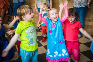 private photography, birthday photography, portrait of happy young kids dancing at a birthday party, Amsterdam