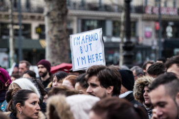 Journalistic photography, event photography, crowd holding signs at demonstration in Paris after the terrorist attack at Charlie Hebdo and November 2015 Paris attacks - Paris, France