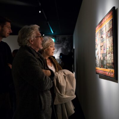 Cultural event photography, visitors are looking at an artwork during opening of exhibition Woest at Outsider Art Museum (Museum van de Geest | Outsider Art in Hermitage Amsterdam