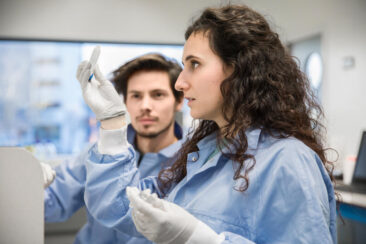 Lifestyle corporate photography, portrait of professional pharmaceutical researchers in their lab, Leiden