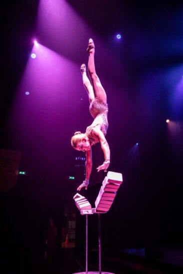 Event photography, festival photography, theatre photography, corporate party photography, event photographer, action shot of an acrobat performing during a Toyota gala diner at Beurs van Berlage, Amsterdam