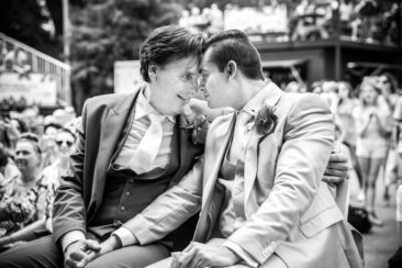 Bruidsfotograaf, trouwfotograaf, Wedding photography, bride photography, elopement photographer, couple photoshoot, a gay couple tenderly looking at each other during their wedding ceremony, Vondelpark, Amsterdam