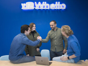 Interior photography, branding photography, corporate lifestyle photography, lifestyle photo of a team of colleagues working together and celebrating success, Whello, Amsterdam