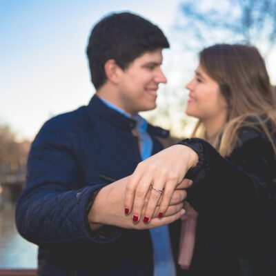Proposal and engagement photography, zoom on the man and woman hand with engagement ring, Amsterdam