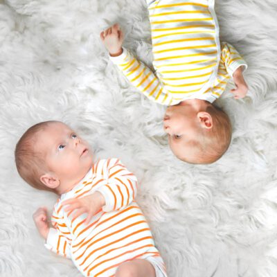 Baby and family lifestyle photoshoot, aerial portrait of 2 baby twins, Amsterdam