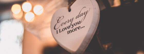 Bruidsfotograaf, trouwfotograaf, Wedding photography, bride photography, elopement photographer, marriage photography, photo of a wooden heart with written on it "Every day I love you more" at a wedding in Amsterdam