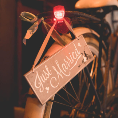 Wedding photography photo of a bridal bike with a "just Married" sign during a wedding in Amsterdam
