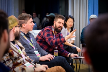 Corporate event photography, conference photography, participants discussing during workshop and breakout sessions during the Spotify conference in Stockholm, Sweden