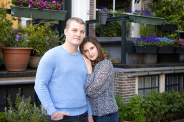 Couple photoshoot, loveshoot, engagement photoshoot: portrait of a couple is posing tenderly near romantic canal Brouwersgracht, Amsterdam