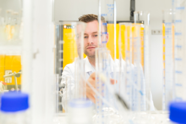 Lifestyle corporate photography, portrait of professional pharmaceutical researchers in their lab, Leiden